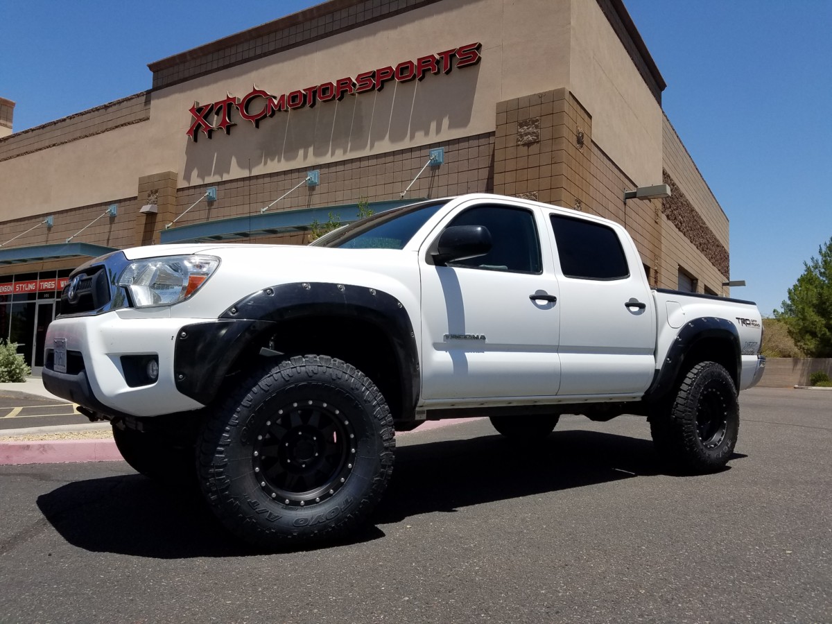Taco Tuesday! 2013 Toyota USATacoma with an ICON Vehicle Dynamics Stage 7 0-3.5" lift with rear air bump stops & Deaver Suspension Inc rear springs & Total Chaos Fabrication Inc. spindle gussets, with Toyo Tires 350/70R16 Open Country A/T II tires on some Method Race Wheels 16x8 Standard's.
