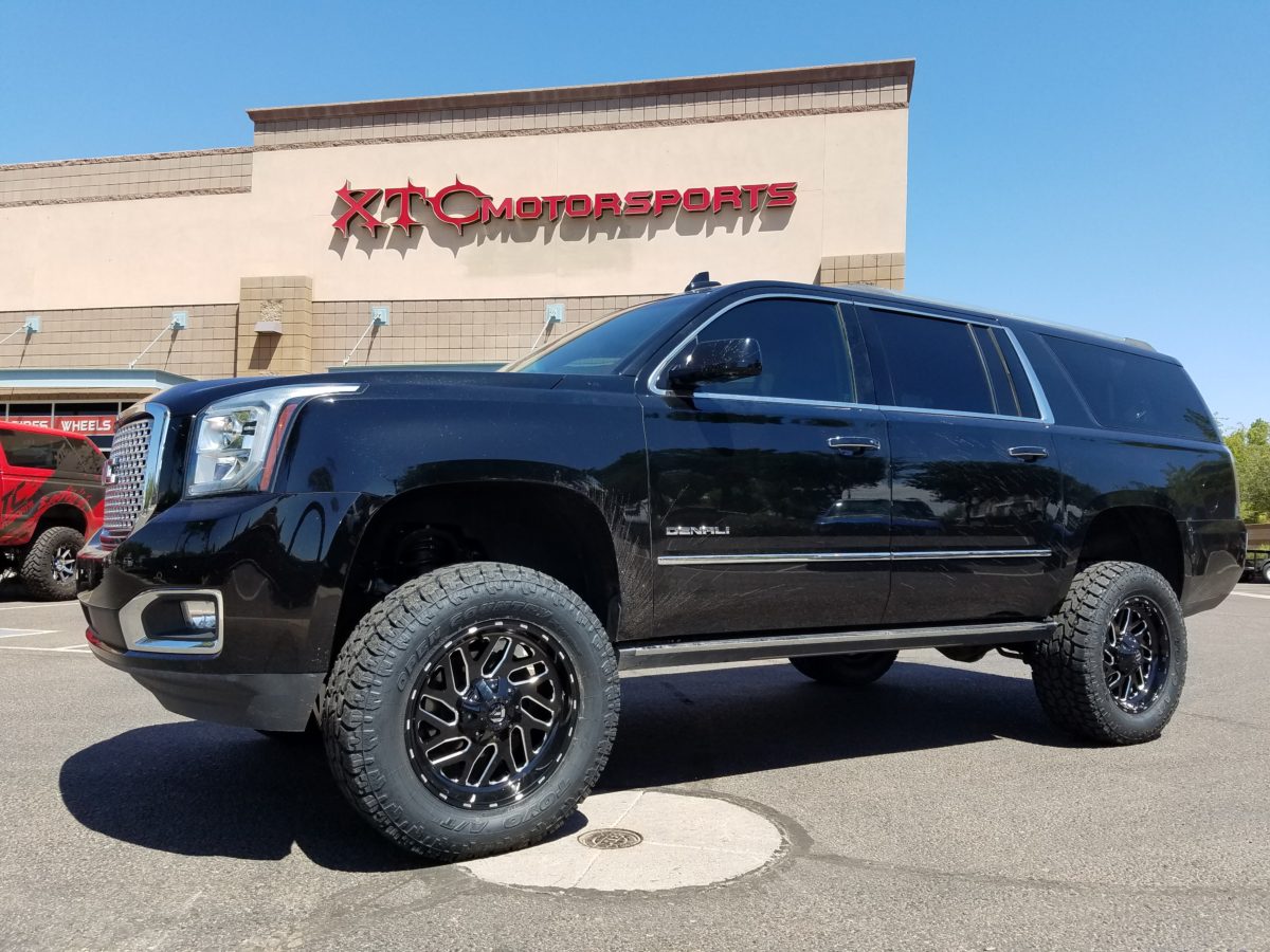 Shannon recently brought in his 2015 GMC Yukon Denali XL for a Fabtech Motorsports 6" suspension lift & some 35x12.50R20 Toyo Tires AT-2 tires wrapped around some Fuel Offroad Black 20x9 D581 Triton wheels.