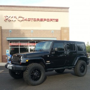 2013 Jeep Sahara with a Readylift 3" SST kit and 35" Mickeythompson tires wrapped on 18" ATX wheels.