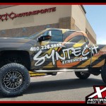 Since we first saw this truck Michael has added a wrap to advertise for his business. He also decided it was time to upgrade from 20 inch wheels to 22's and go from 35 inch tall tires to 37's, so we installed a set of 22