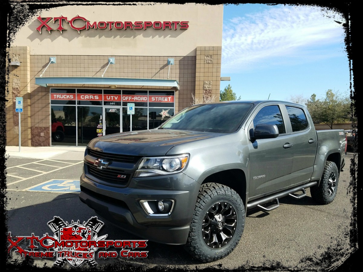Rich wanted to do some upgrades to his 2016 Chevrolet Colorado Z71 so he wanted XTC Motorsports to do the work for him. We installed a ReadyLift Suspension Inc. 2" leveling kit with some 265/70R17 Nitto Tire Ridge Grapplers on some Fuel Offroad 17x8.5 Matte Black Assault wheels. We also installed a set of N-FAB nerf bars, window tint, & a spray in bed liner.