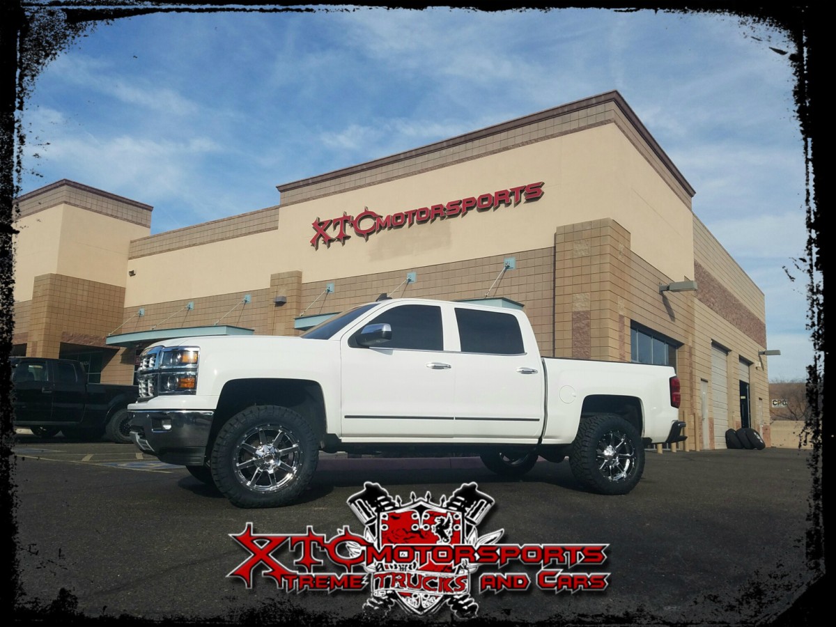 Jason brought in his 2015 Chevrolet Silverado 1500 4wd for a ReadyLift Suspension Inc. 4" SST suspension lift with 33x12.50R20 Nitto Tire Ridge Grapplers wrapped around some 20x9 Fuel Offroad Chrome Maverick Wheels & a B&W Trailer Hitches tow & stow dual ball mount.