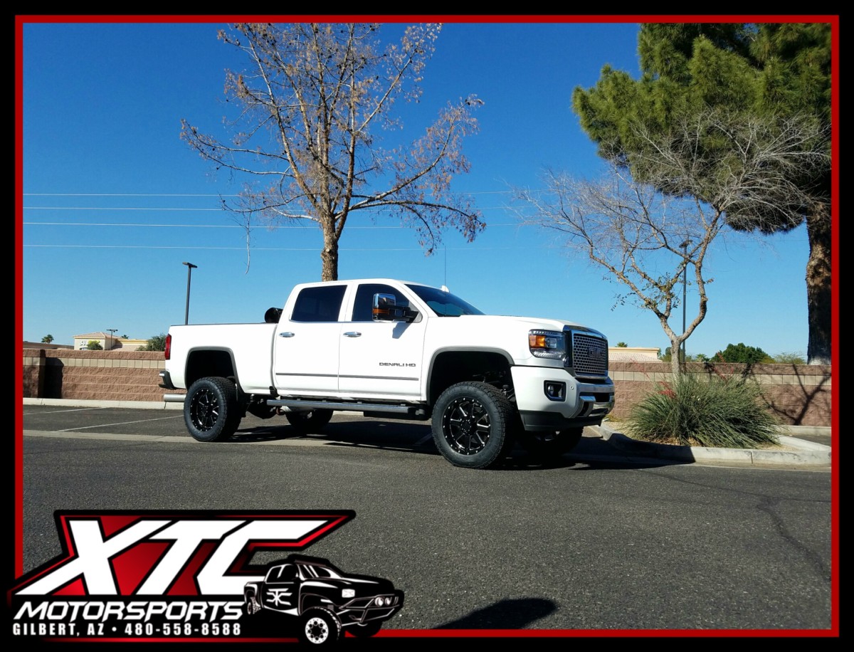 Kyle brought us his 2015 GMC Sierra Denali 2500HD for a Cognito Motorsports, Inc 4-6" Non Torsion Bar Drop suspension lift with Fox Racing 2.0 Performance series shocks, Ride-Rite rear load leveling airbags with an Air Lift WirelessONE air control unit using a Daystar Products International airbag cradle kit, all of this is standing on some 295/60R20 Nitto Tire Terra Grappler G2's on some Gear Alloy Wheels gloss black with CNC milled accents 726MB Big Blocks.