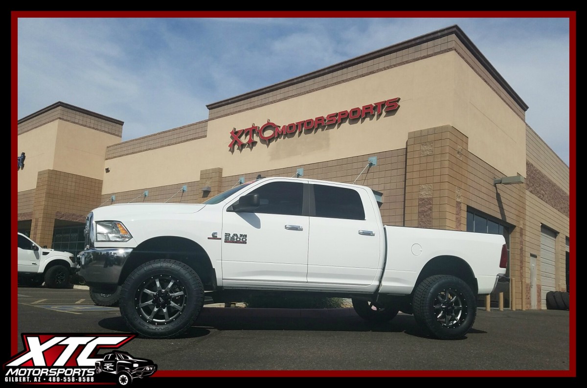 Our friends over at azautorv.com wanted us to make this 2016 Ram 2500 look great on their lot, so we put a 3"/1" ReadyLift Suspension Inc. SST kit on it with some N-FAB wheel-to-wheel nerf steps all of this standing tall on some 295/65R20 Nitto Tire Terra Grappler G2's wrapped around some 20x9 Moto Metal MO970 Grey w/black lip wheels.