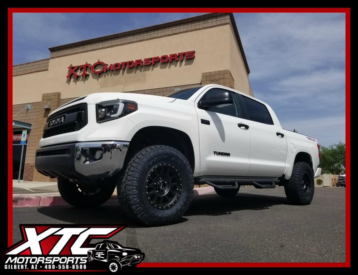 Ali dropped off his 2017 Toyota USA Tundra for a set of Zone Offroad Products upper control arms with Fox Racing 2.5" Remote Reservoir coilovers in the front and a set of 2.0 Reservoir shocks in the rear with a ReadyLift 1" block kit, we also installed a set N-FAB Podium steps and a Bak Industries folding tonneau cover with vinyl top, and all of this is standing up on a set of 18x9 Method Race Wheels Black grids wrapped with a set of 35x12.50R18 Toyo Tires Open Country ATII's.