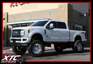 Colby brought in his 2017 Ford Motor Company F250 Super Duty for a BIGTIME overhaul. First we installed a custom blue powder coated Bulletproof Suspension 10-12" lift with 2.5" Coil Overs, a set of 40x15.50R22 Toyo Tires Open Country M/T's wrapped around a set of custom painted Fuel Offroad Forged FF09 wheels. We also installed a Pace Edwards Truck Bed Tonneau Covers electric bed locker.