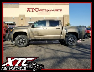We just built this 2017 GMC Canyon for Alec. We installed an ICON Vehicle Dynamics Stage 4 suspension system, a set of 265/70R17 Toyo Tires Open Country AT II's wrapped around a set of Fuel Offroad Black & Milled Maverick wheels, AMP Research PowerSteps & BedXtender HD Sport, & a set of Husky Liners rear wheekl weel guards.