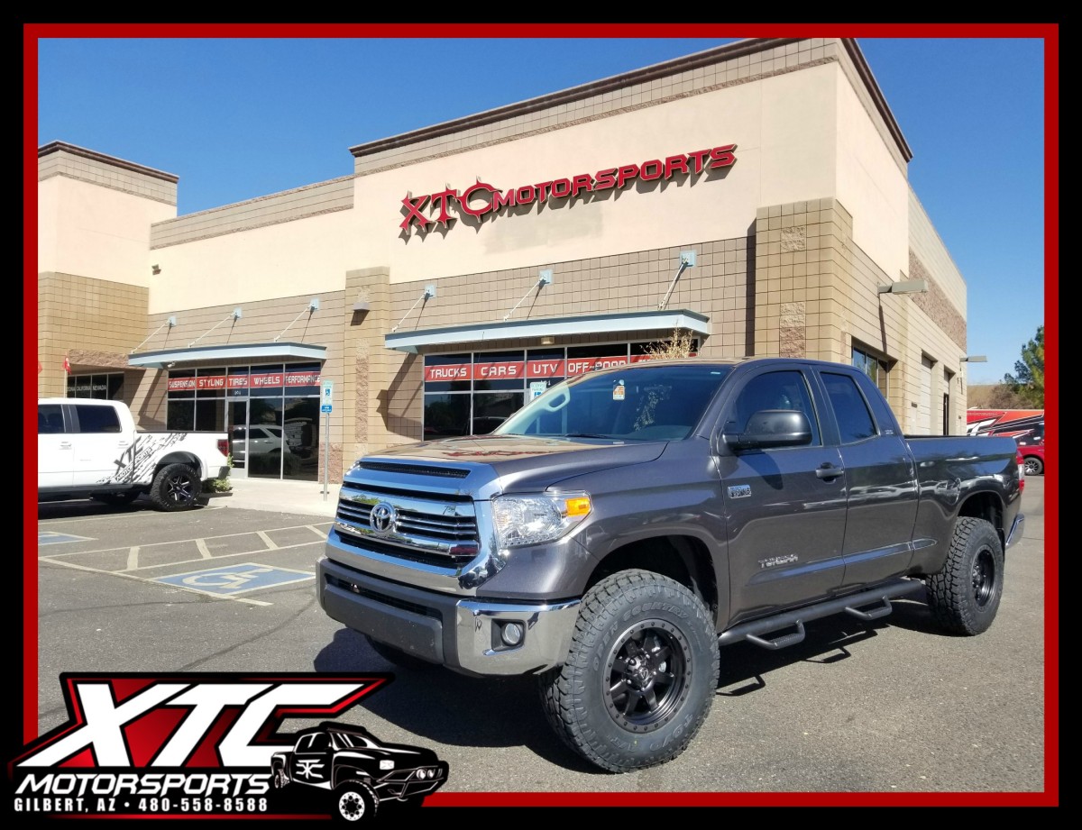 We just finished up this 2017 Toyota USA Tundra by putting on a CST Performance Suspension 3" front/1" rear lift with a set of 18x9 Fuel Offroad D551 Matte Black with Anthracite ring wheels wrapped with a set of 285/75R18 Toyo Tires Open Country ATII's. We also installed a set of N-FAB wheel-to-wheel nerf steps.