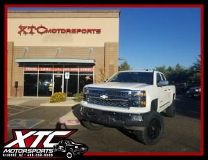 John brought in his 2014 Chevrolet Silverado 1500 for a Zone Offroad Products 6.5" suspension lift, a set of 35x12.50R20 Toyo Tires Open Country R/T's on his KMC Wheels XD series XD800 Black Misfit wheels.