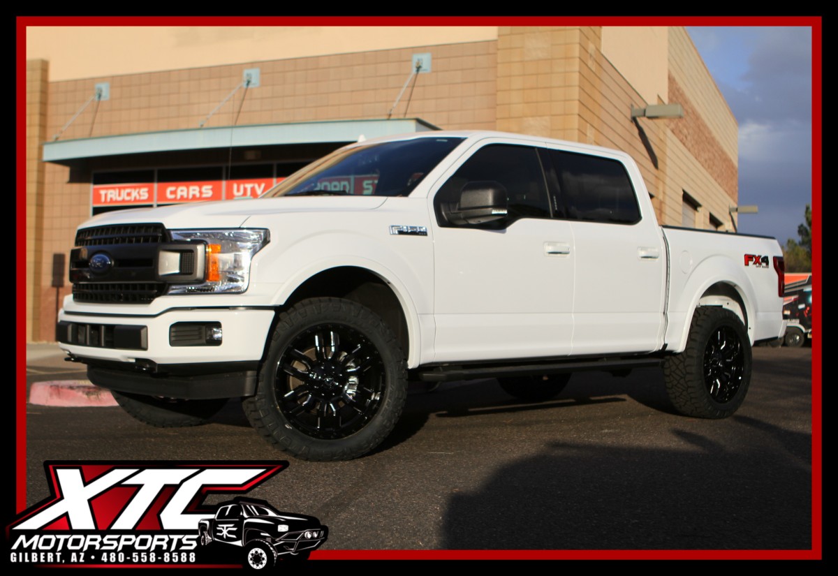 We recently put a Daystar 2" Leveling Kit, a set of 22x9.5 Fuel Offroad Gloss Black & Milled Sledge wheels wrapped with a set of 285/55R22 Nitto Ridge Grappler tires on this 2018 Ford Motor Company F150.