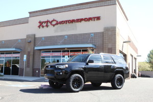 We recently installed a ReadyLIFT 3" SST lift and a set of Fuel OffRoad D630 Matte Black Tactic wheels wrapped with a set of LT285/65R18 Nitto Ridge Grappler tires on Nichole's 2015 Toyota 4Runner.