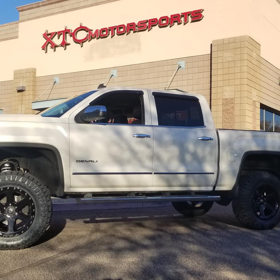 We recently installed a 7" MaxTrac spindle lift with Fox coilovers & rear shocks and 20x9 Fuel Offroad Gloss Black Ripper wheels, wrapped in a set of 35x12.50R20LT Nitto Ridge Grappler tires, on Scott's 2014 GMC Sierra 1500 Denali.
